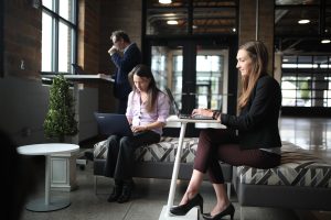 Consultants at work in an office during the realization phase of an SAP S/4HANA programme